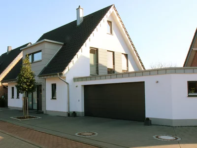 Einfamilienhaus in Verl, Putz, Satteldach