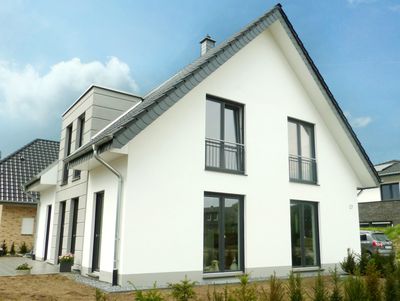 Einfamilienhaus in Rietberg, Putz, Satteldach