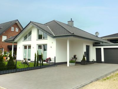 Einfamilienhaus in Rietberg, Bungalow, Putz, Satteldach