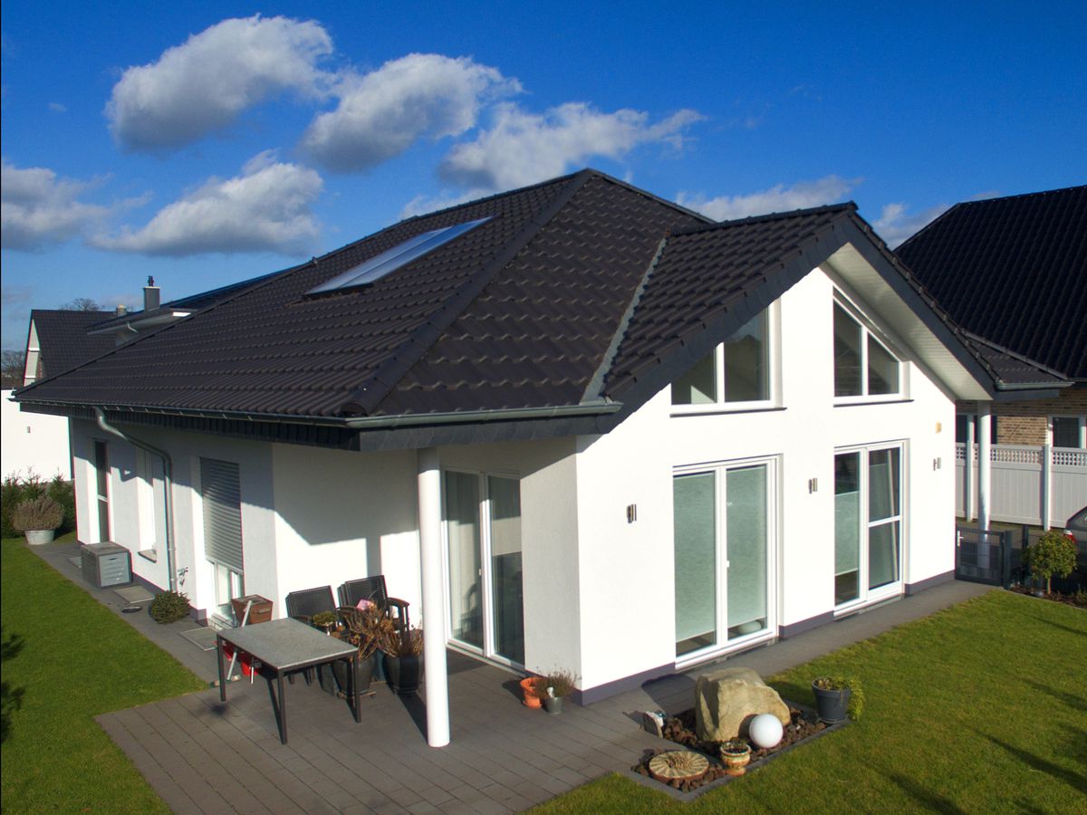 Einfamilienhaus in Rietberg, Bungalow, Putz, Satteldach