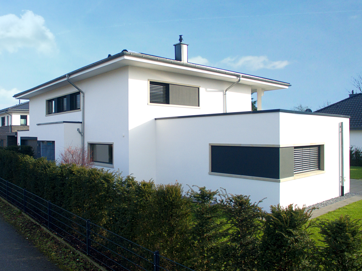 Einfamilienhaus in Rietberg, Stadtvilla, Bauhaus-Stil, Zeltdach, Putzfassade, Standstein